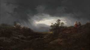 rising-storm-above-a-hilly-and-wooded-landscape