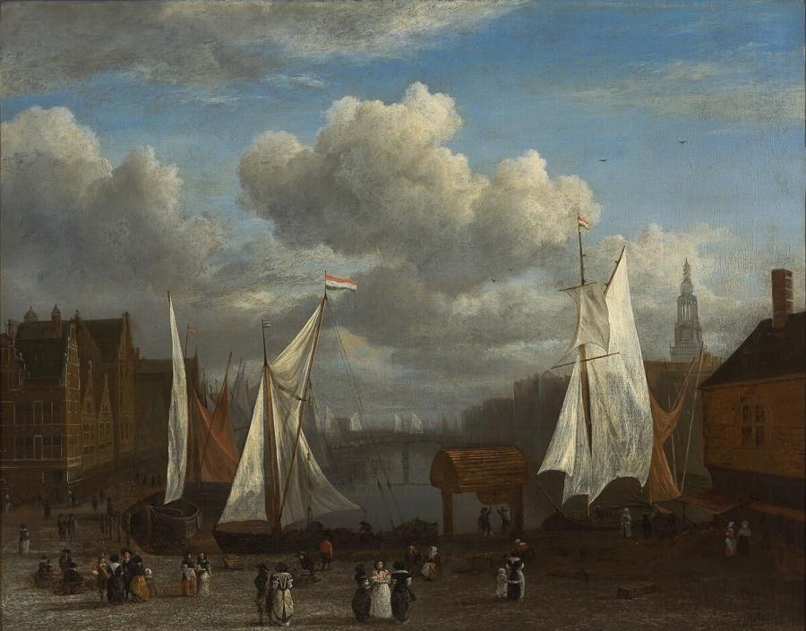 Gezicht op het Damrak met op de voorgrond de Dam te Amsterdam
