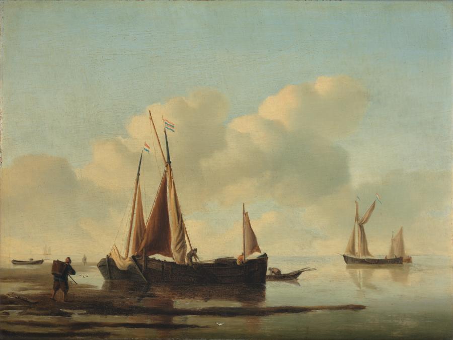 Calm sea with fishing-boats near the coast