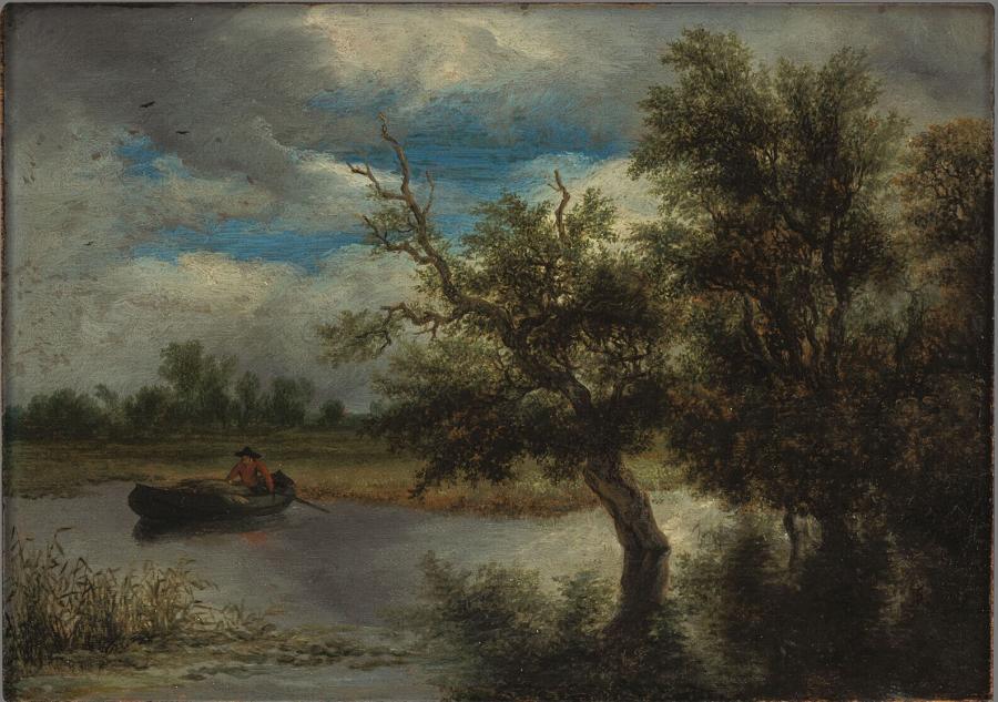 Bomen aan een plas met roeiboot