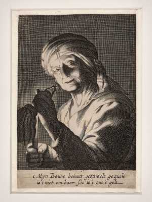 oude-vrouw-bij-kaarslicht