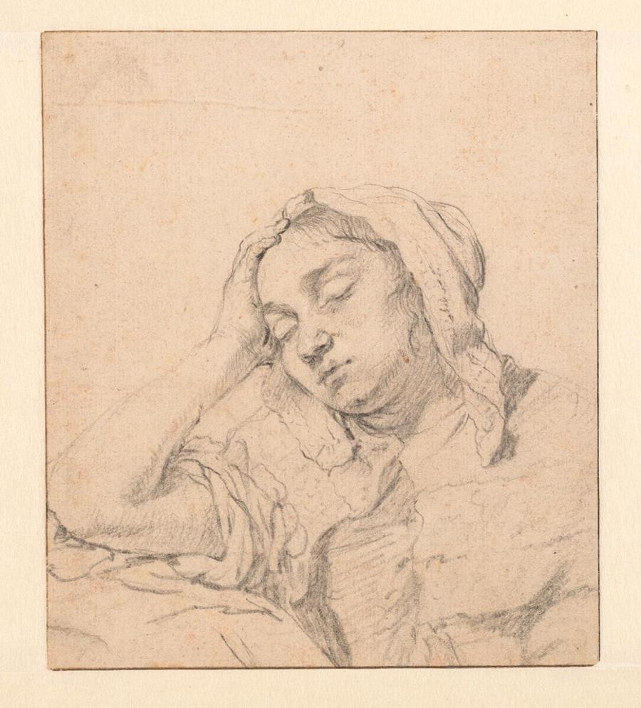 Slapende vrouw op haar arm rustend