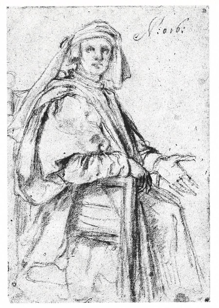 Portret van een man met een hoofdtooi zittend in een leunstoel