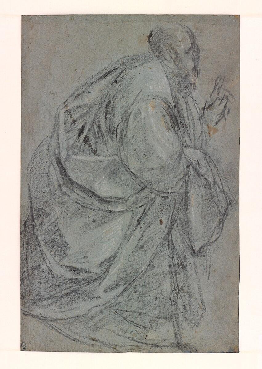 Bearded dignitary gesturing with his left hand