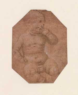 nude-boy-sitting-on-the-ground