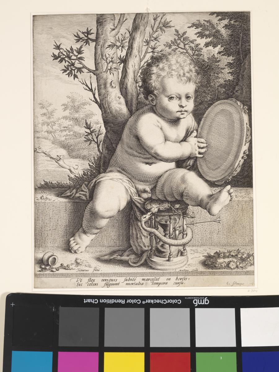 A Child Playing a Tambourine