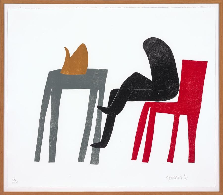 Figure behind a table