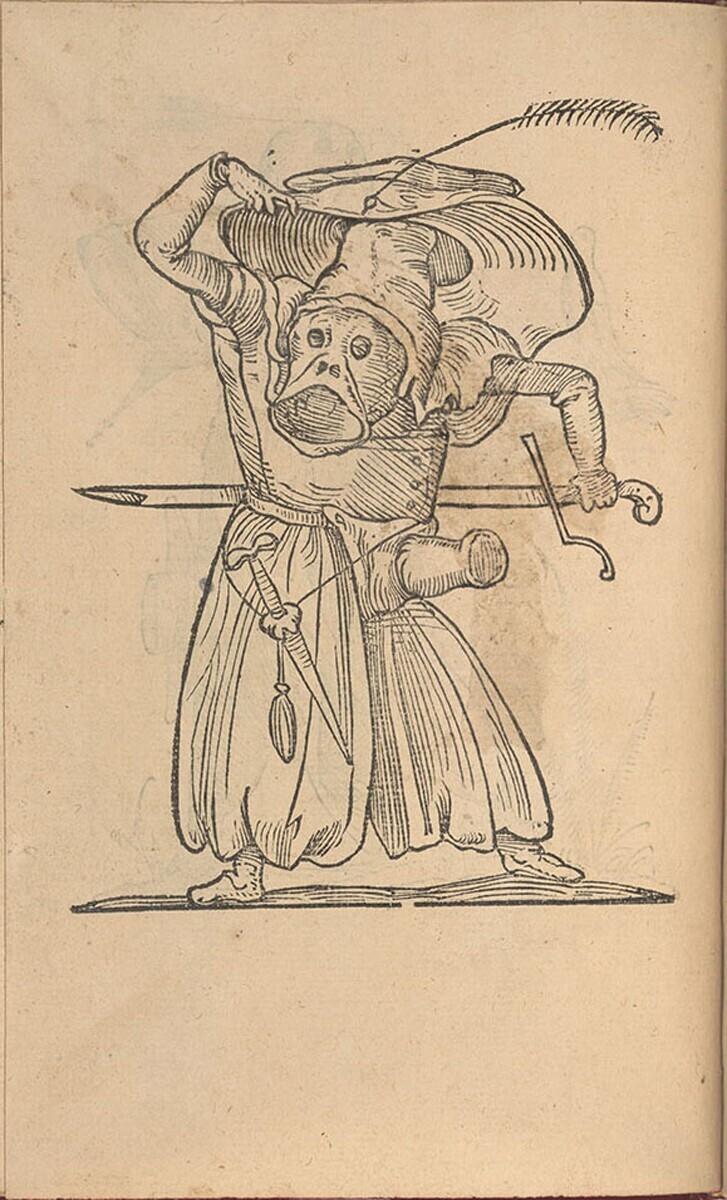 Hybride figuur met vissenkop, grote hoed en braguette