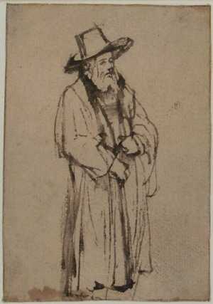 standing-man-in-broad-brimmed-hat