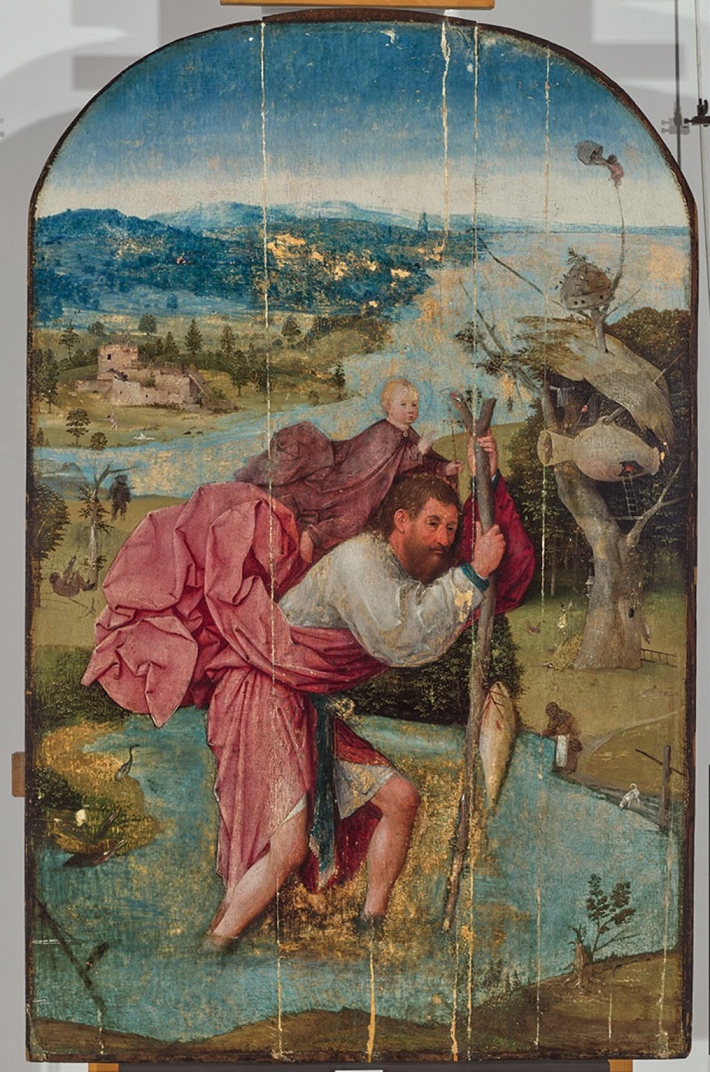 Het schilderij voor de restauratie: Jheronimus Bosch, De heilige Christoffel, 1490-1505, olieverf op paneel, bruikleen: Stichting Museum Boijmans Van Beuningen 1940, foto: Atelier Boersma